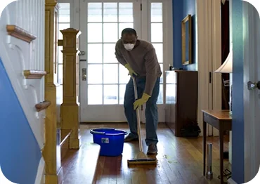 Worker performing Apartment Cleaning